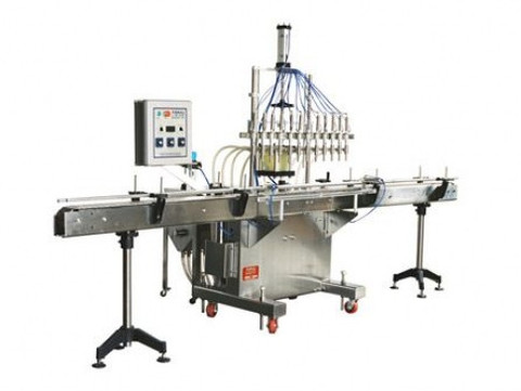 Liquid filling machine equipment sold online with Natronics Equipment